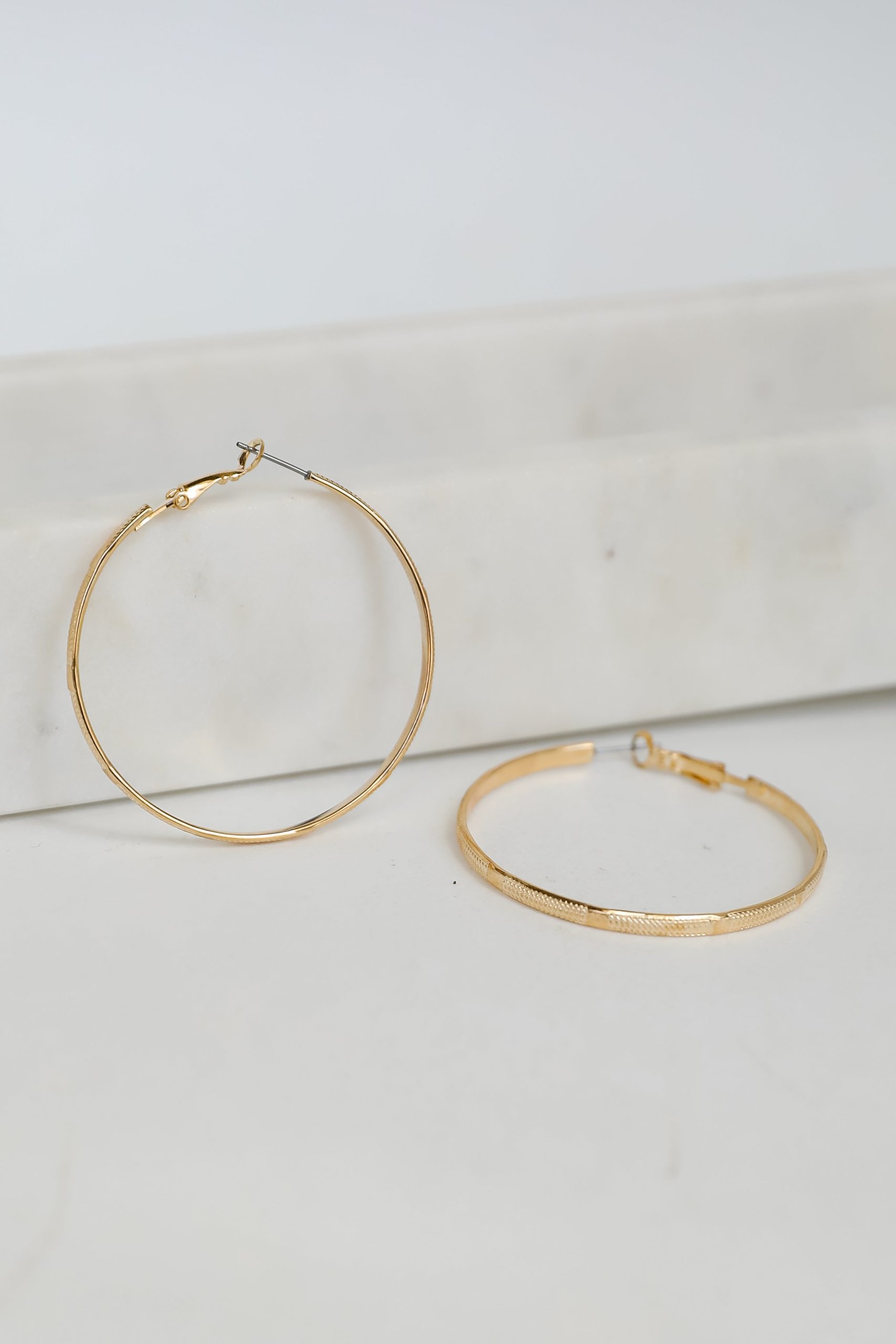 shopdressup_gold_hoop_earrings-3_f5db678d-599e-44a2-b1f9-fa64a62138fd.jpg