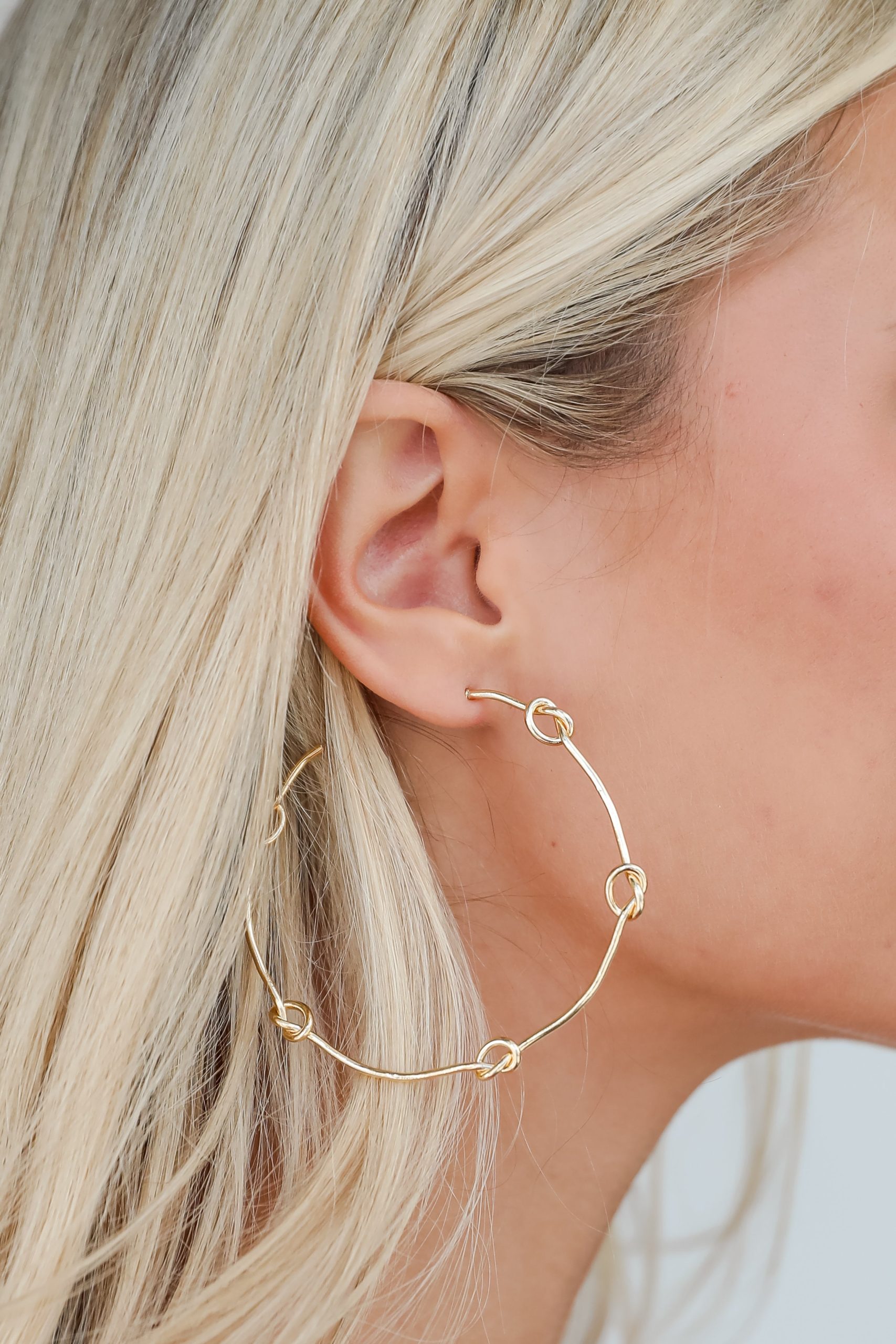 shopdressup_knotted_hoop_earrings.jpg